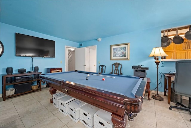 game room with pool table and light tile patterned floors