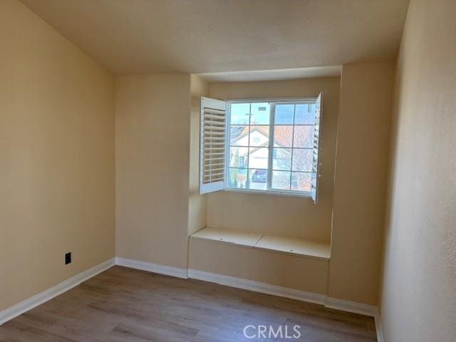 unfurnished room featuring light wood-type flooring