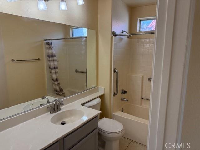 full bathroom featuring shower / bath combination with curtain, vanity, toilet, and tile patterned flooring