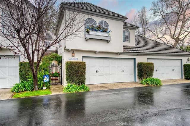 view of front of property featuring a garage