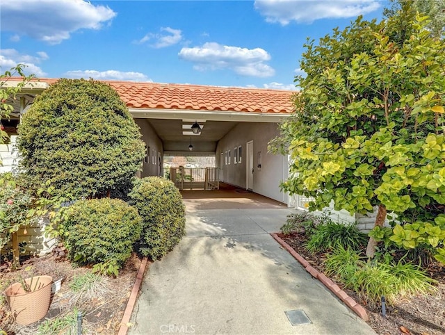 exterior space with a carport