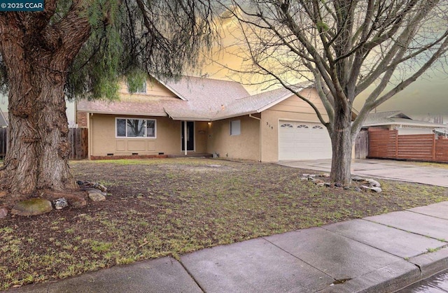 ranch-style home with a garage