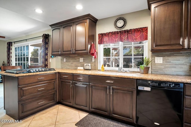 kitchen with sink, light tile patterned floors, dishwasher, dark brown cabinetry, and kitchen peninsula