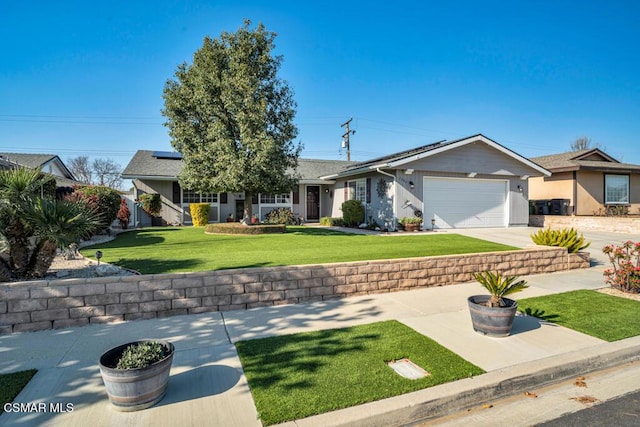 single story home featuring a garage, a front yard, and solar panels