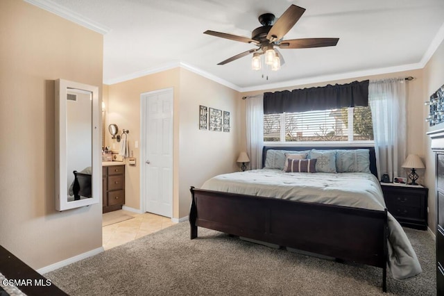 carpeted bedroom featuring ornamental molding and ceiling fan