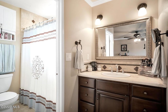 bathroom with decorative backsplash, vanity, toilet, crown molding, and a shower with shower curtain