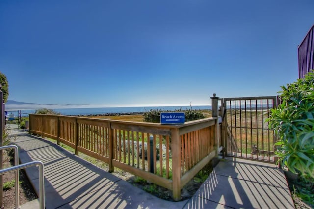 deck featuring a water view