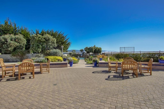 view of community with a patio area