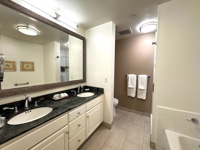 full bathroom featuring independent shower and bath, vanity, and toilet