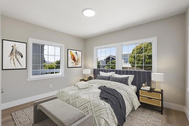 bedroom featuring hardwood / wood-style flooring