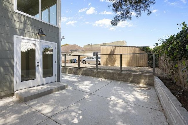 view of patio featuring french doors