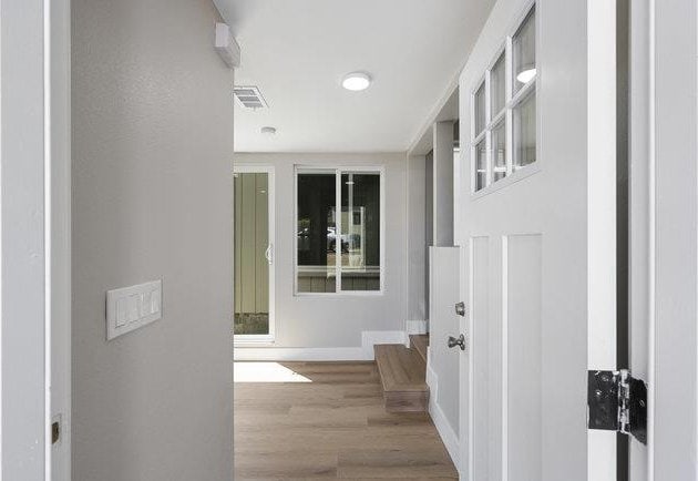 hallway featuring light hardwood / wood-style floors