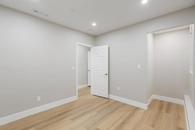 unfurnished bedroom featuring light hardwood / wood-style flooring