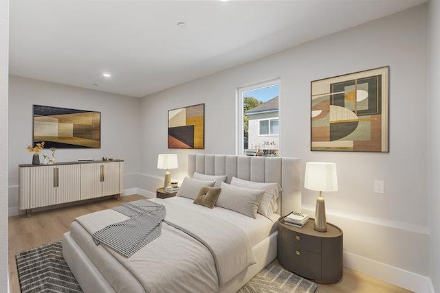 bedroom featuring wood-type flooring