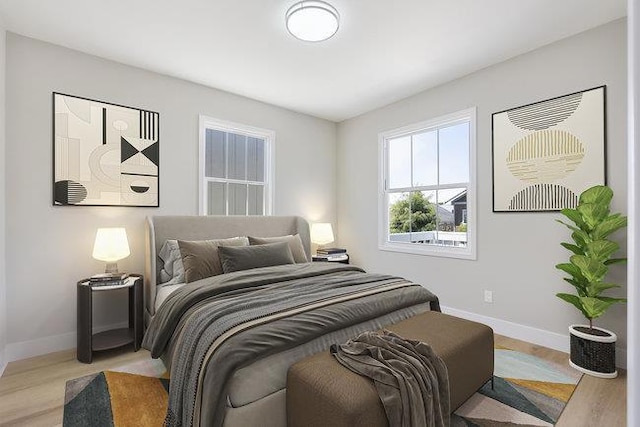 bedroom featuring light wood-type flooring