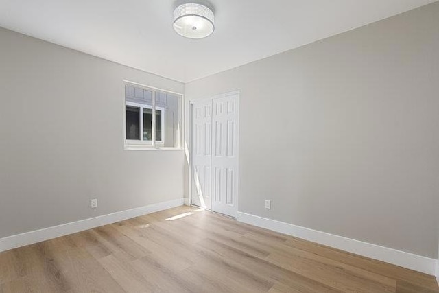 unfurnished room featuring light hardwood / wood-style floors