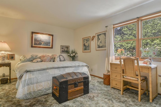 bedroom featuring carpet