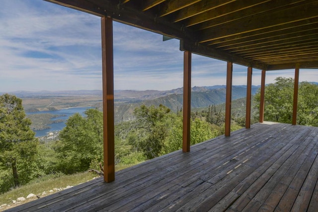 deck featuring a water and mountain view