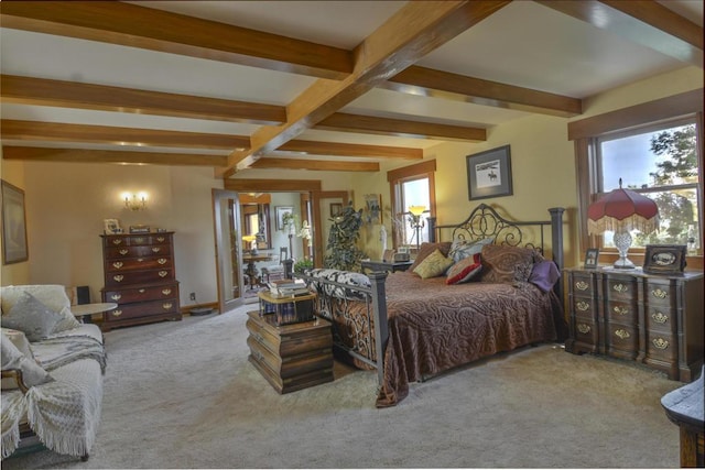 carpeted bedroom featuring beam ceiling