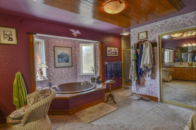 bathroom featuring vanity, separate shower and tub, and wood ceiling