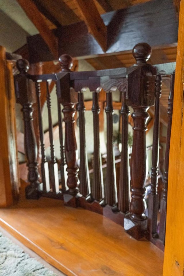 staircase featuring wood-type flooring