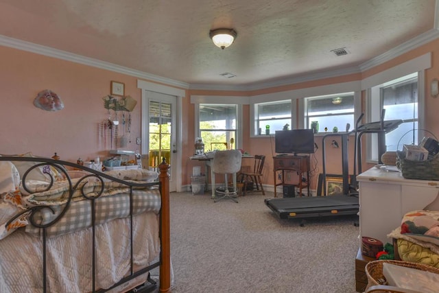 carpeted bedroom featuring ornamental molding and a textured ceiling