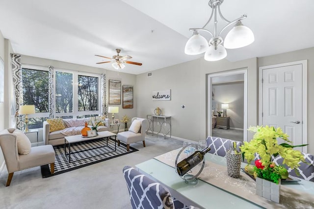 carpeted living room featuring ceiling fan