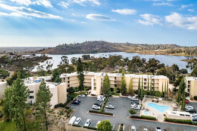 birds eye view of property with a water view