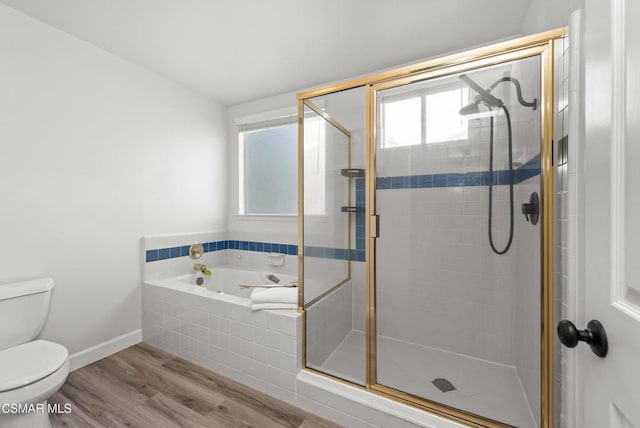 bathroom featuring independent shower and bath, wood-type flooring, and toilet