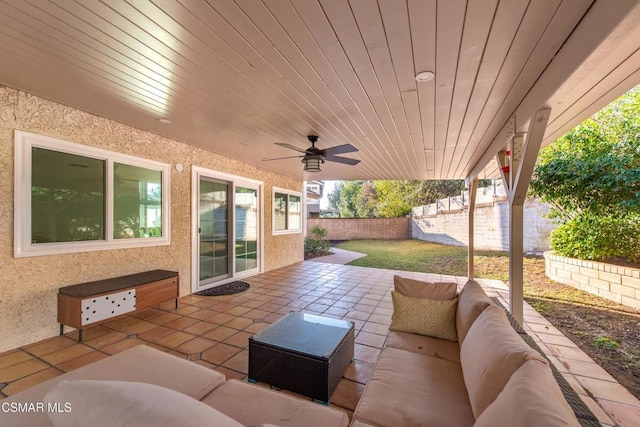 view of patio featuring ceiling fan and outdoor lounge area