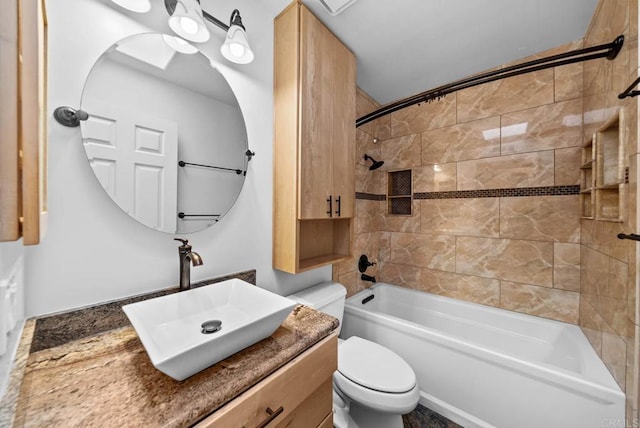 bathroom with toilet, shower / washtub combination, and vanity