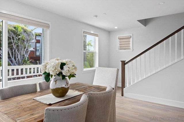 dining room with light hardwood / wood-style flooring