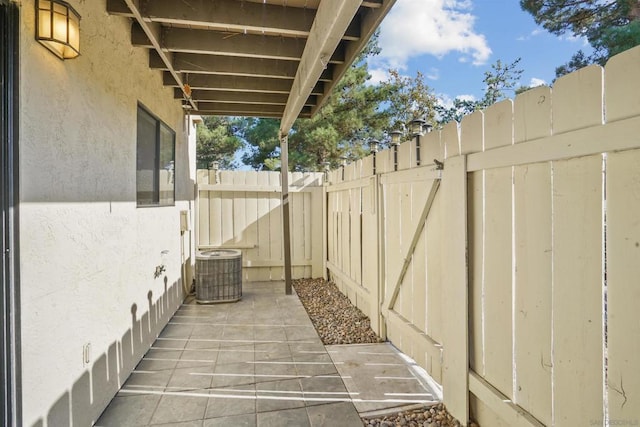 view of patio / terrace with central AC unit