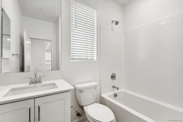 full bathroom with vanity, tub / shower combination, and toilet