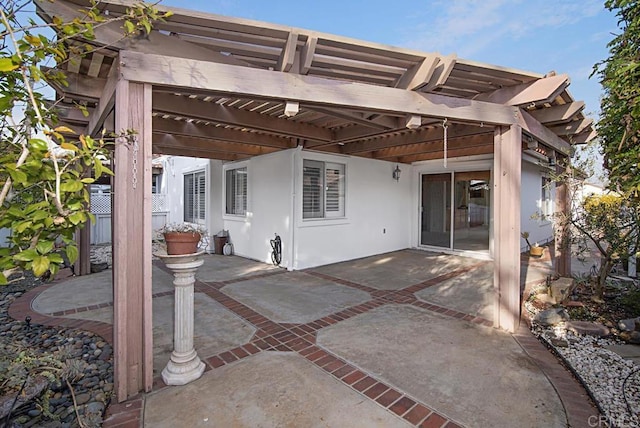 view of patio featuring a pergola