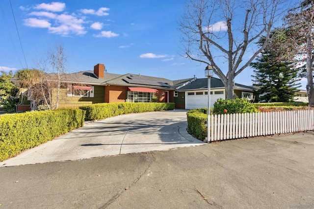 ranch-style home with a garage