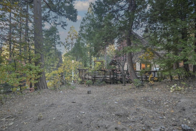 view of yard featuring a deck