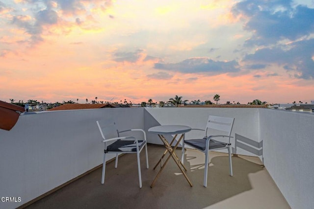 view of patio terrace at dusk