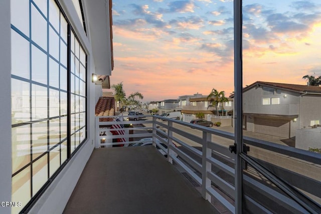 view of balcony at dusk