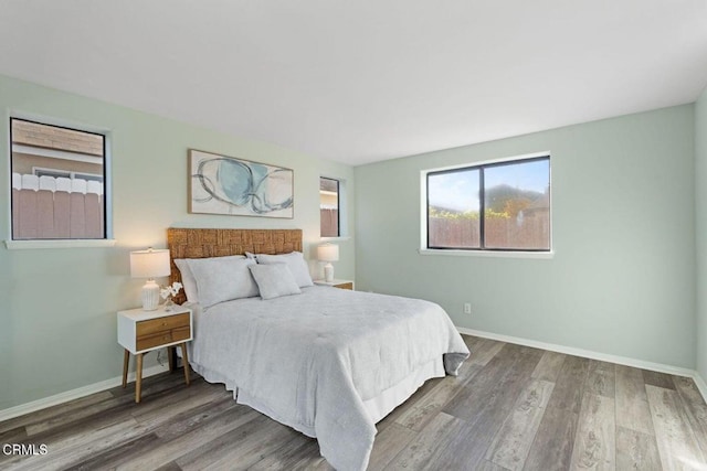 bedroom featuring hardwood / wood-style floors