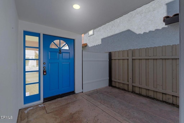 entrance foyer featuring concrete floors