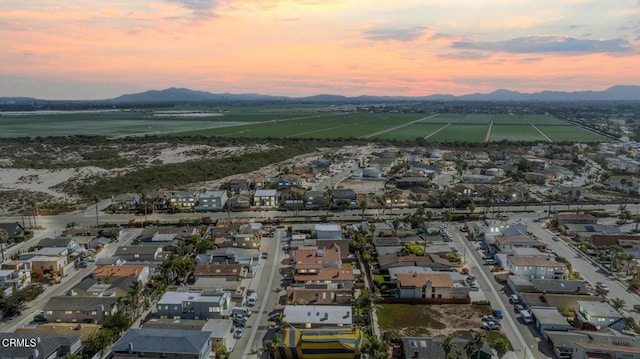 aerial view at dusk with a mountain view