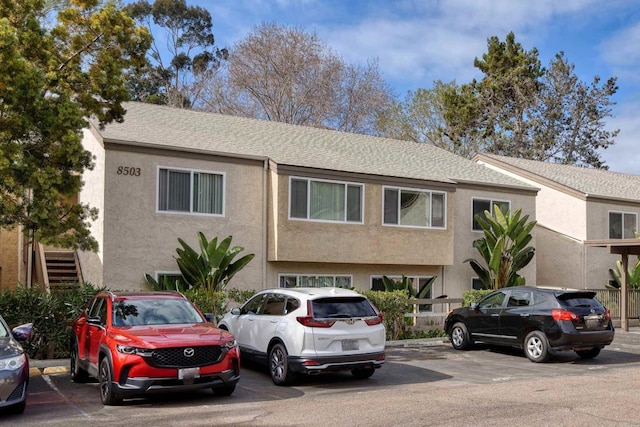 8503 Villa La Jolla Dr Unit B, La Jolla, CA 92037 - multi unit property featuring stucco siding, uncovered parking, and a shingled roof