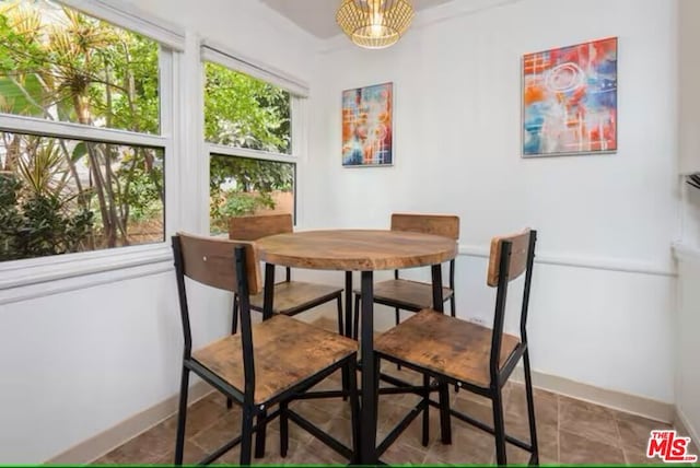 dining area featuring a wealth of natural light