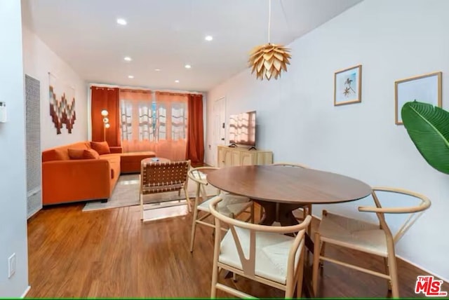 dining area with light hardwood / wood-style flooring