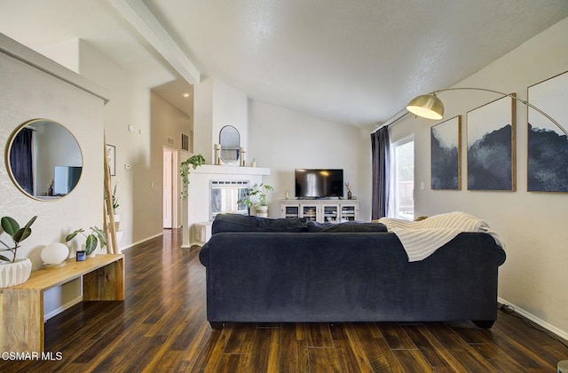 living room with lofted ceiling with beams and dark hardwood / wood-style floors