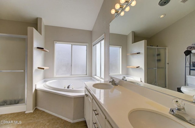 bathroom with vanity, tile patterned floors, lofted ceiling, and independent shower and bath