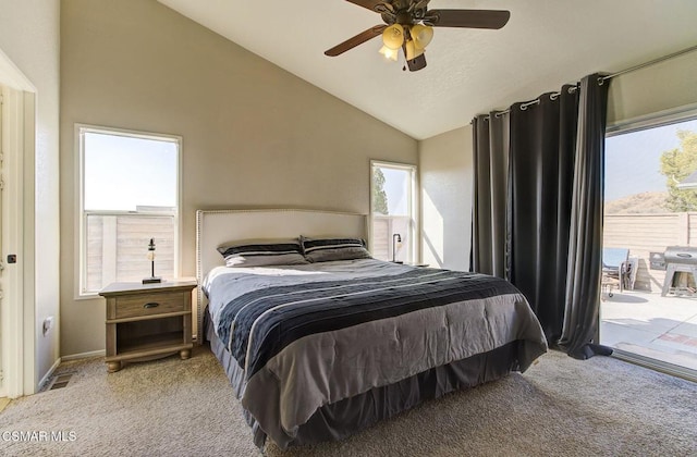 bedroom featuring light carpet, access to exterior, lofted ceiling, and ceiling fan