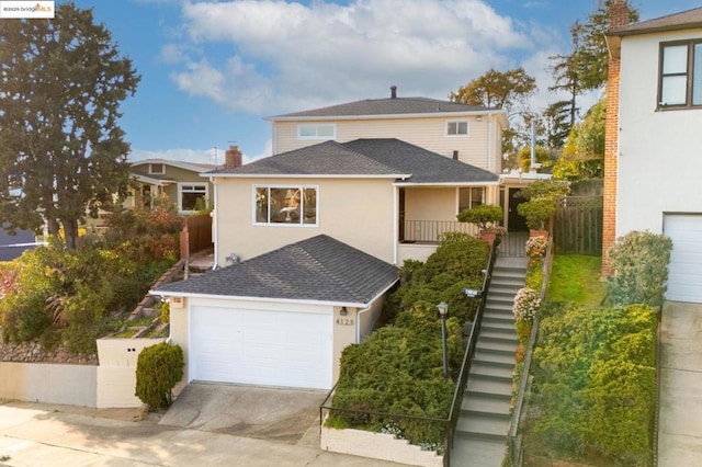 front of property with a garage