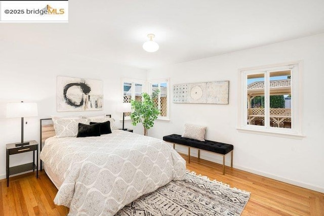 bedroom featuring hardwood / wood-style floors